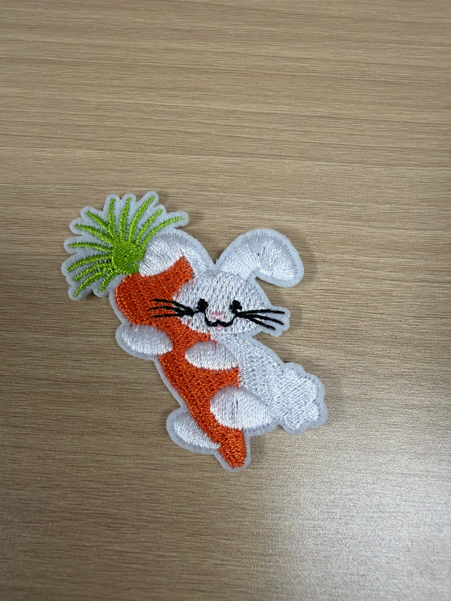 Bunny Sitting on Carrot Iron On Patch – Easter Patch